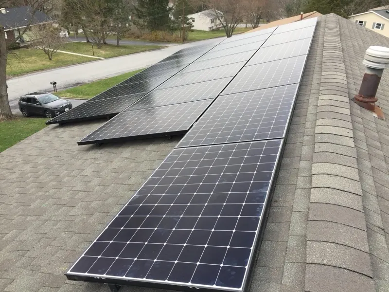 Solar panels on a shingle roof in northern New York